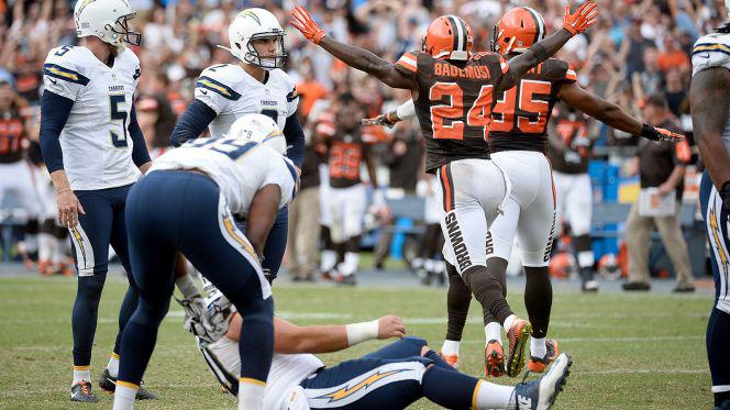 Oct 4, 2015; San Diego, CA, USA; Cleveland Browns cornerback Johnson Bademosi (24) and outside linebacker Armonty Bryant (95) celebrate a missed field goal by San Diego Chargers kicker Josh Lambo  Robert Hanashiro